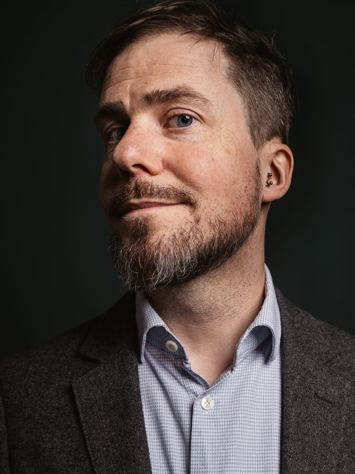Close-up portrait of Christoph Landes in a blazer
